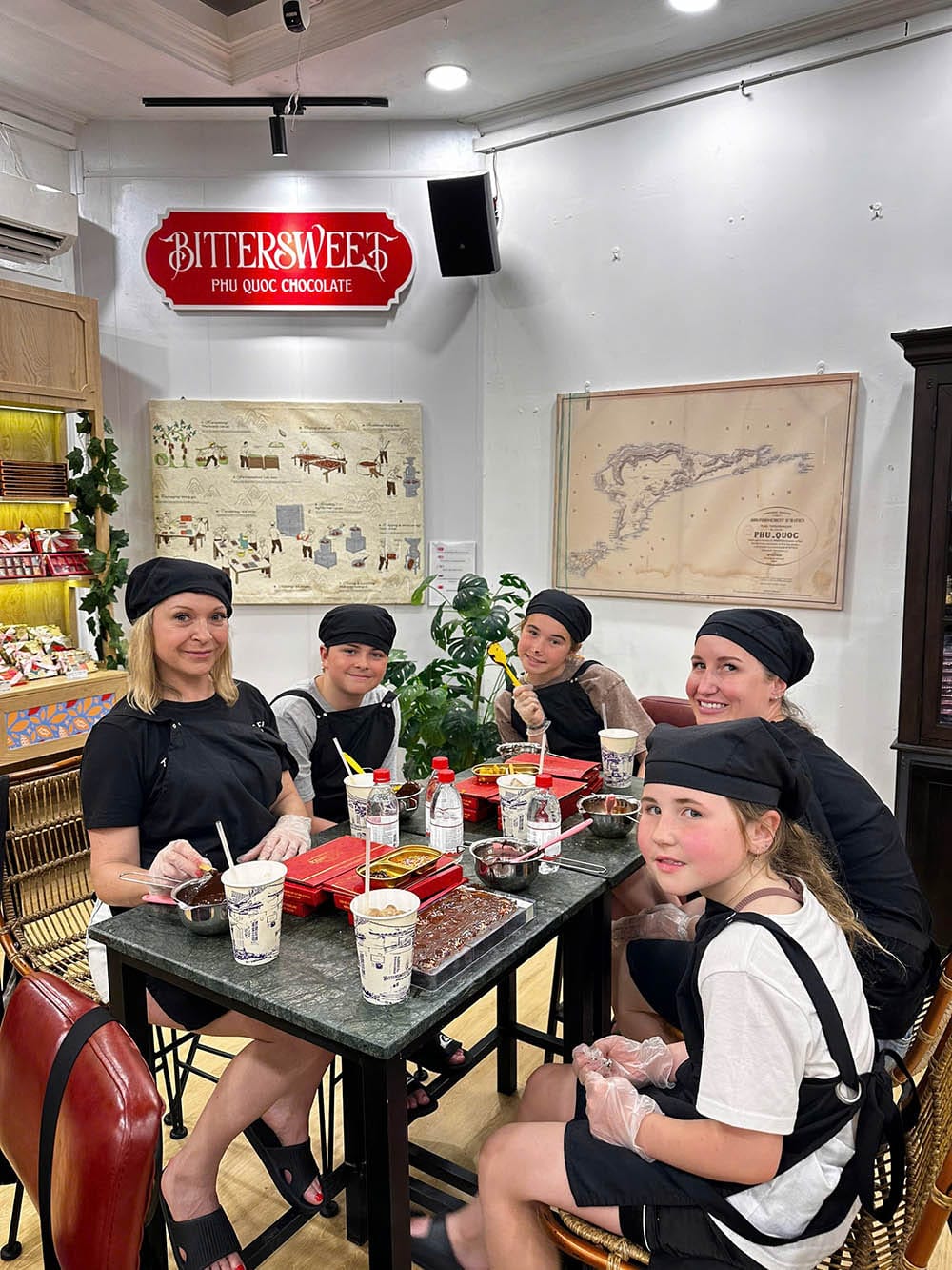Guests enjoy a hands-on chocolate workshop together at Bittersweet Chocolate Factory in Phu Quoc.
